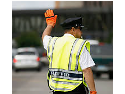 Follow the directions of the police officer — Alberta traffic-signals road sign for Class 7 test