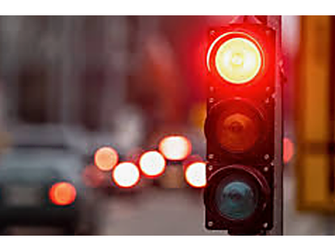 Stop and proceed only when safe — Alberta traffic-signals road sign for Class 7 test
